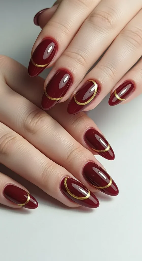 Burgundy French Nails with Gold Accent